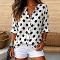 Laura | Polka dot print V-neck button down top 1