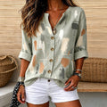 Katrina | Abstract paint print split V-neck button top 1