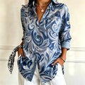 Joan | Blue swirl paisley print collared button down top 1